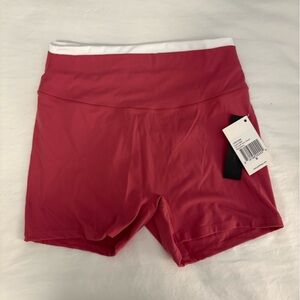 Size medium pink Goldhinge bike shorts